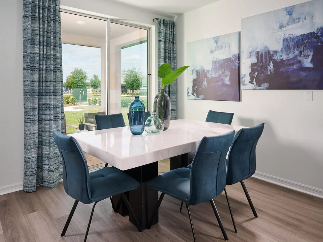 The Reserve at Twin Lakes — Dining room in Hibiscus floorplan modeled at The Reserve at Twin Lakes