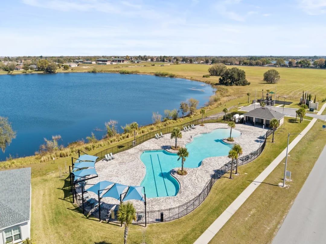 Villamar — Resort-style community pool and clubhouse at Villamar