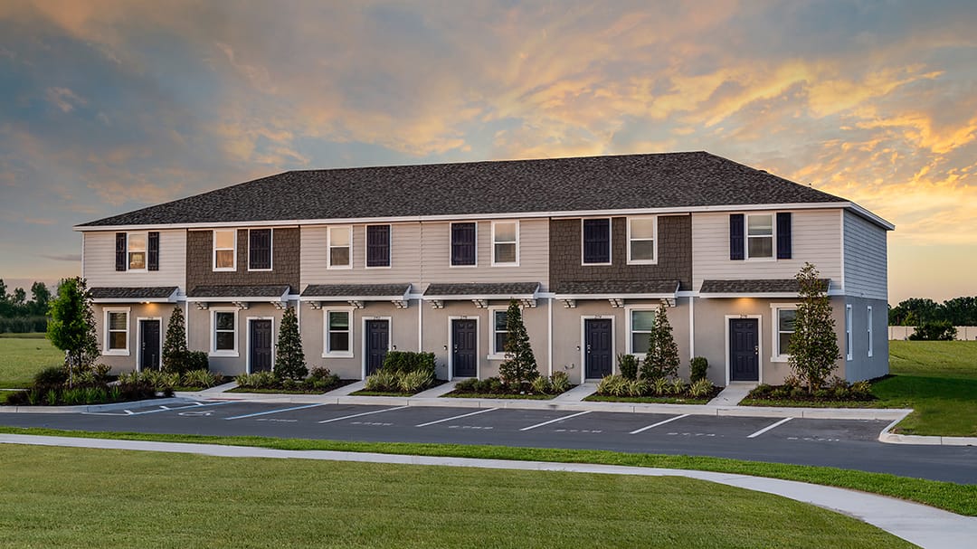 Southloch — Townhome-style condos at dusk