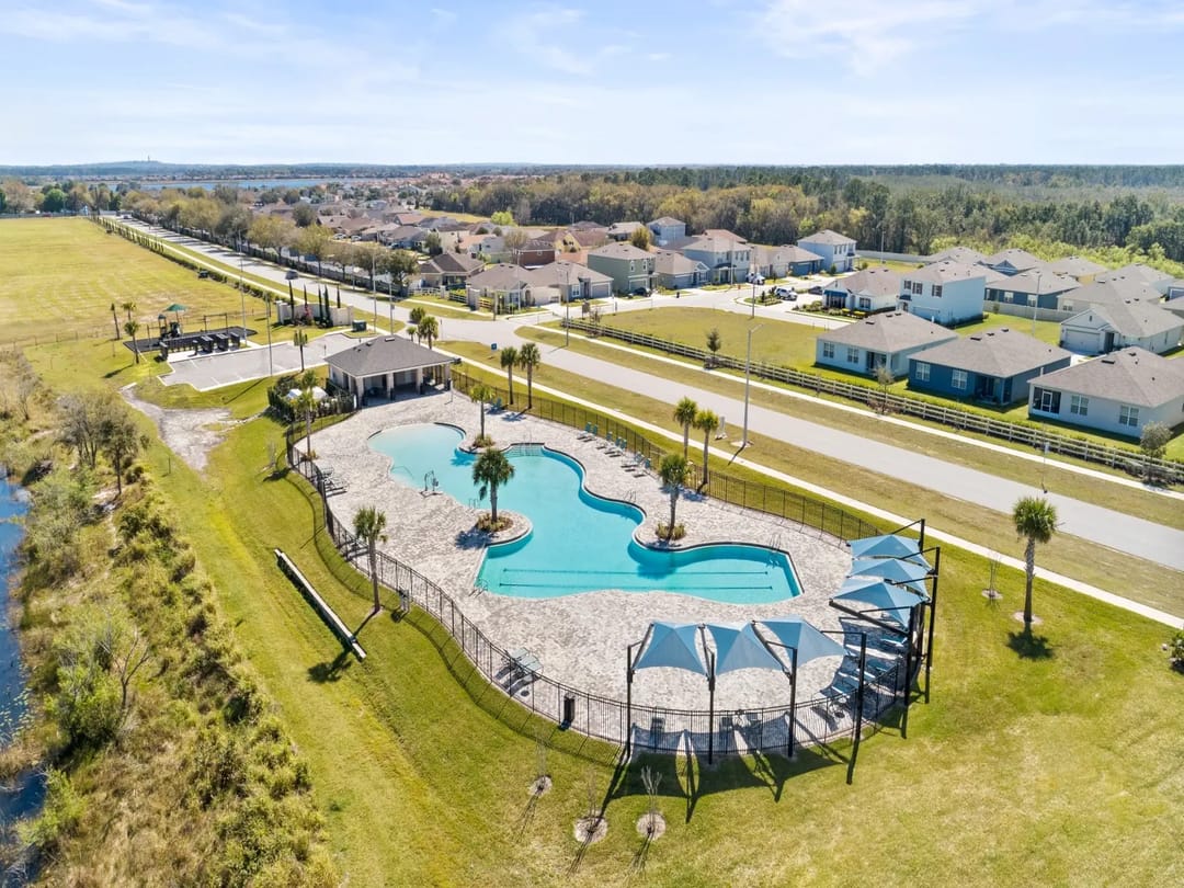 Villamar — Resort-style community pool and clubhouse at Villamar