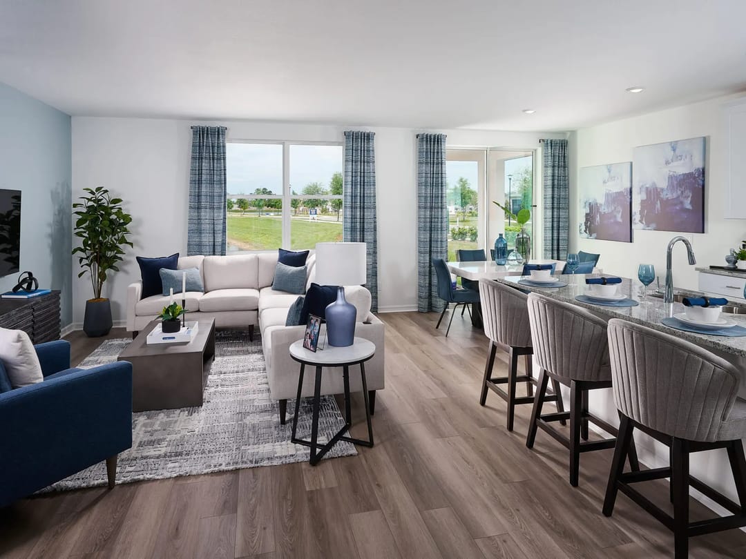 The Reserve at Twin Lakes — Great room in Hibiscus floorplan modeled at The Reserve at Twin Lakes