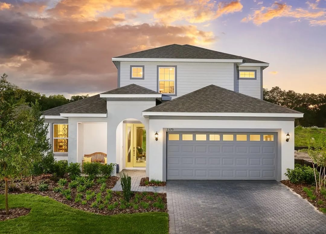 Summerbrooke — Two-story white stucco home
