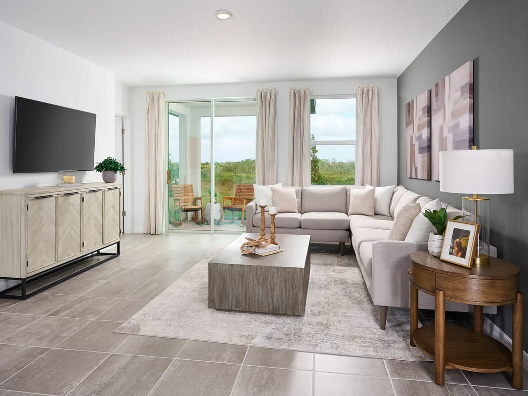 Springs at Lake Alfred — Living room in the Yellowstone floorplan modeled at Springs at Lake Alfred