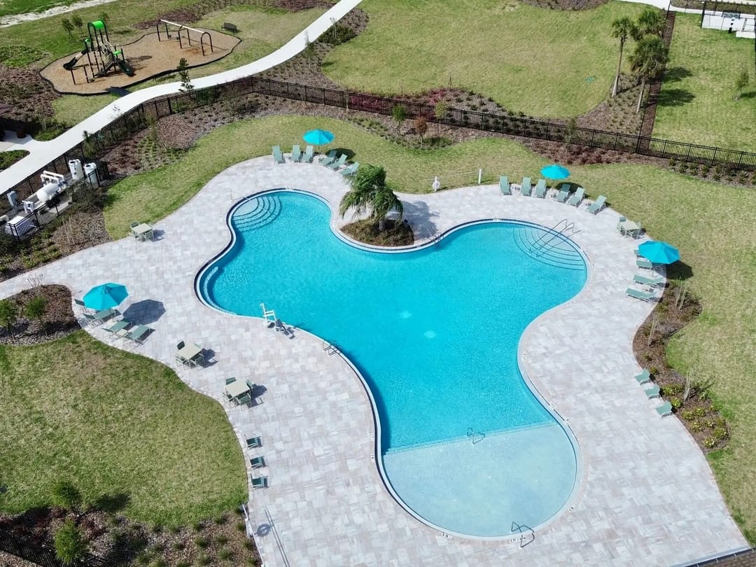 The Reserve at Hammock Oaks — Resort-style pool, clubhouse, and playground