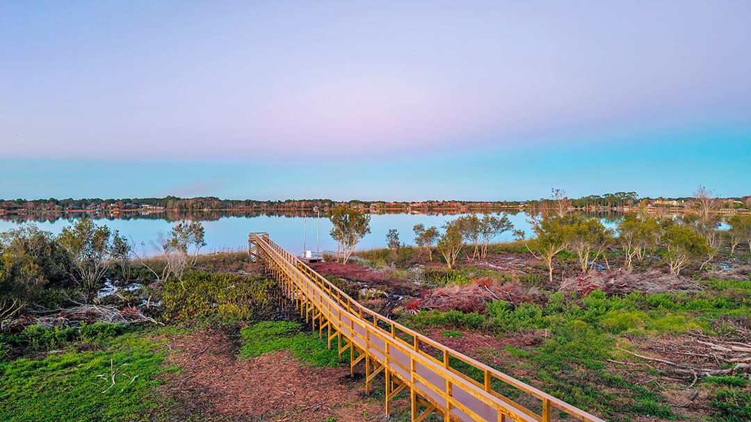 Lochside — Boardwalk and lake at dusk
